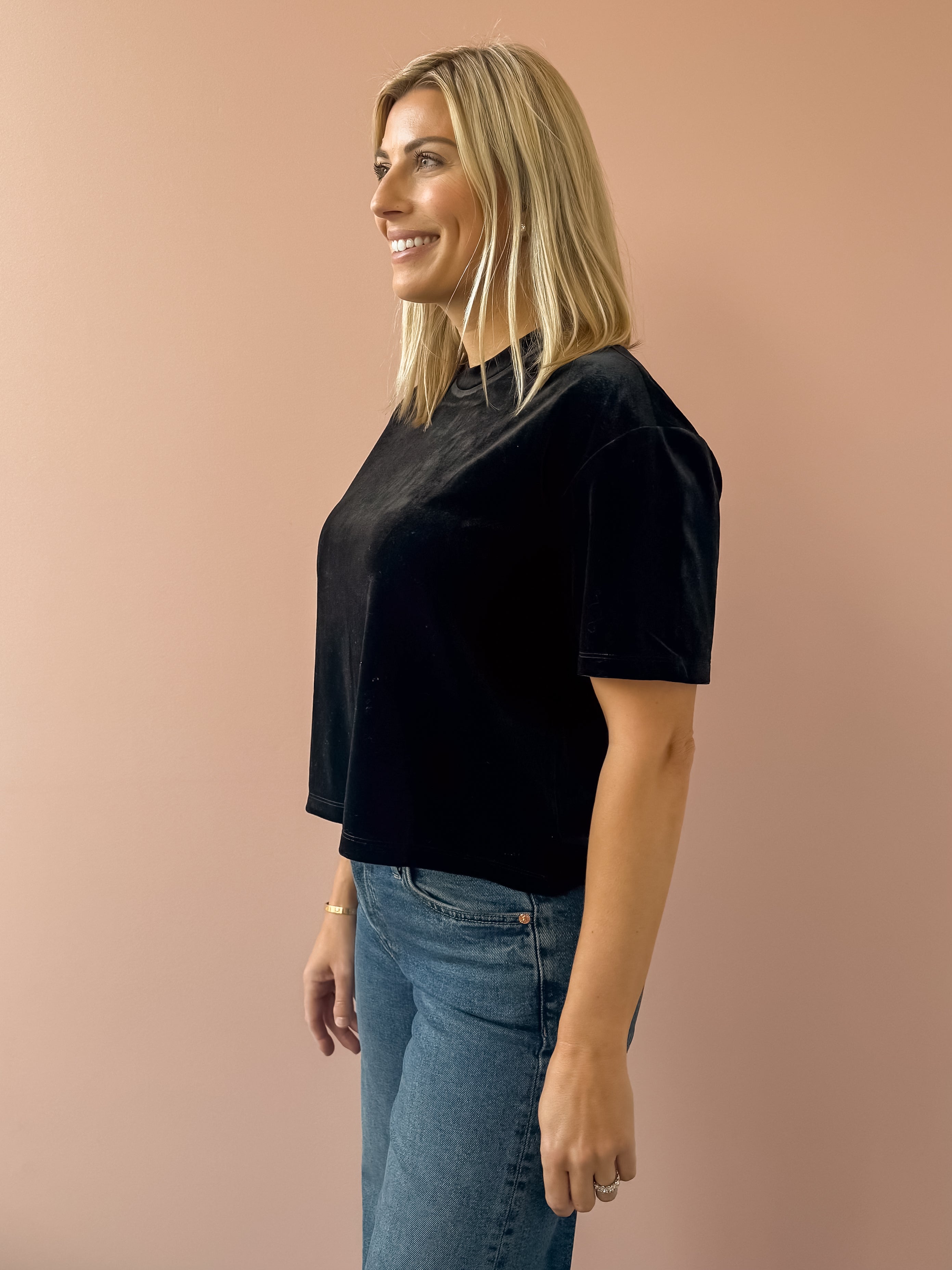 Dear John Maddox Short Sleeve Top in black, side close-up.