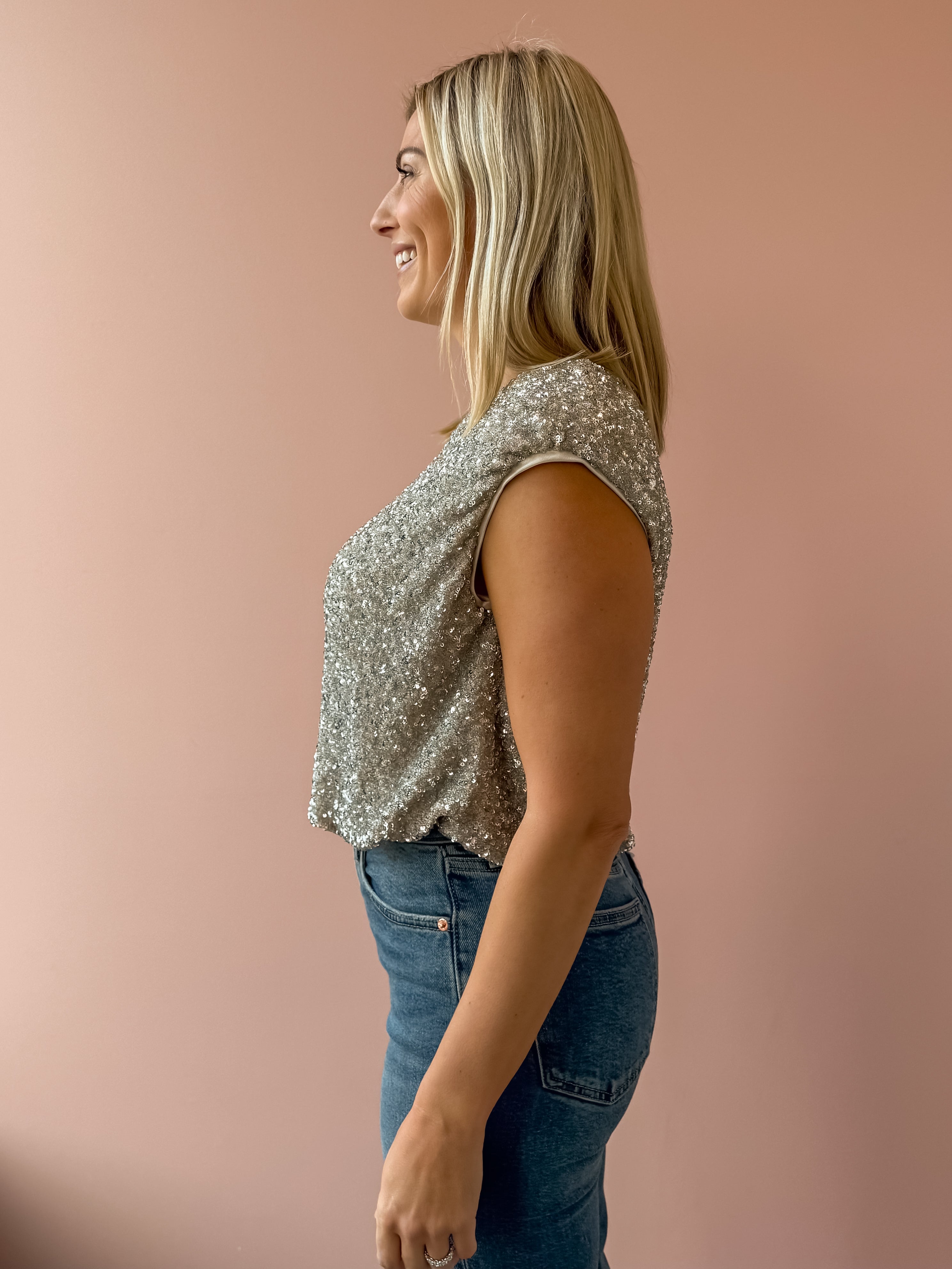Sadie & Sage Luster Sequin Cami Top in silver, side view.