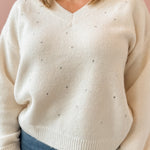 Adelyn Rae Angie Sweater in white, close-up of the crystal studs.