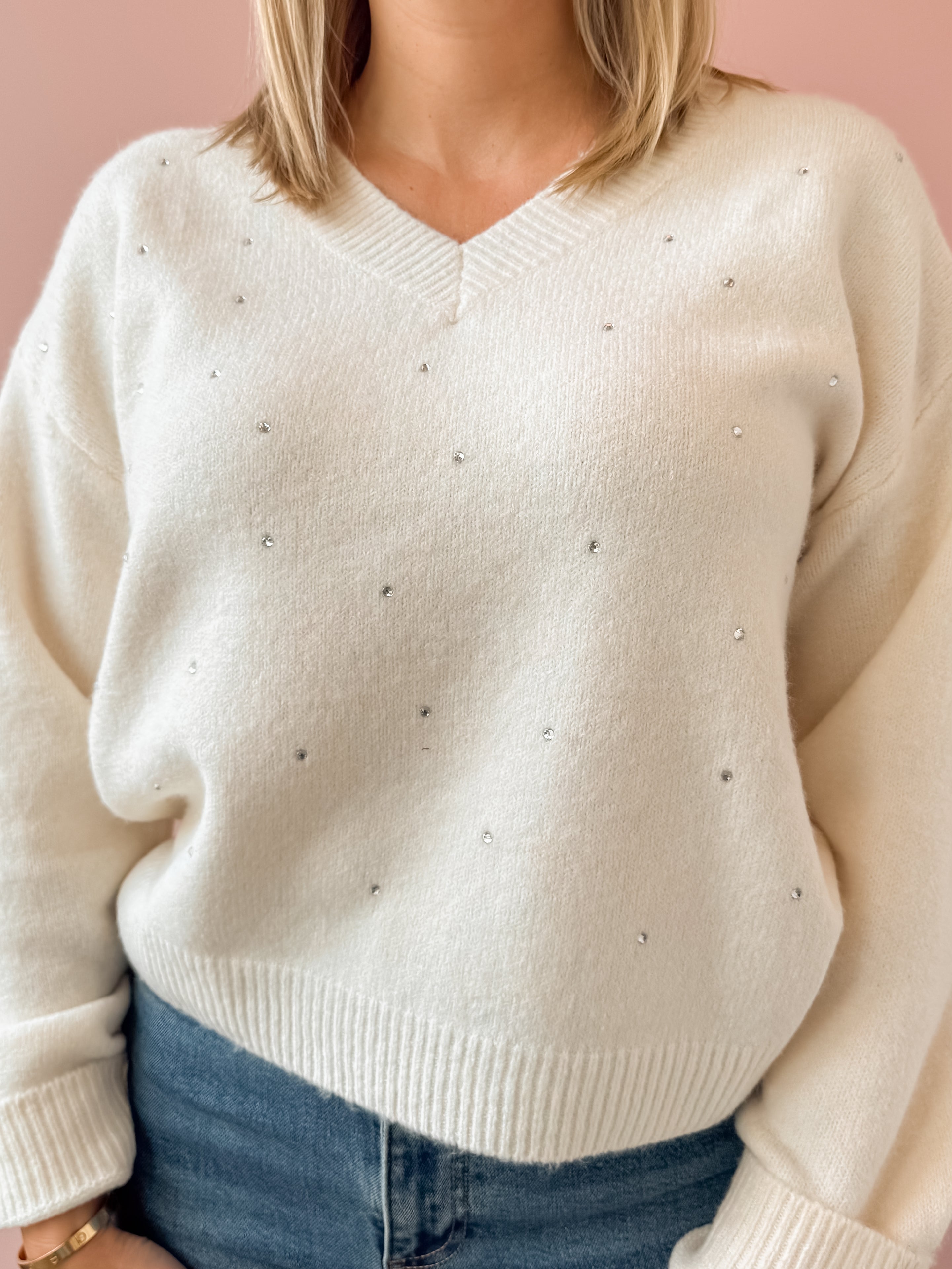 Adelyn Rae Angie Sweater in white, close-up of the crystal studs.