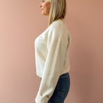 Adelyn Rae Angie Sweater in white, side view.