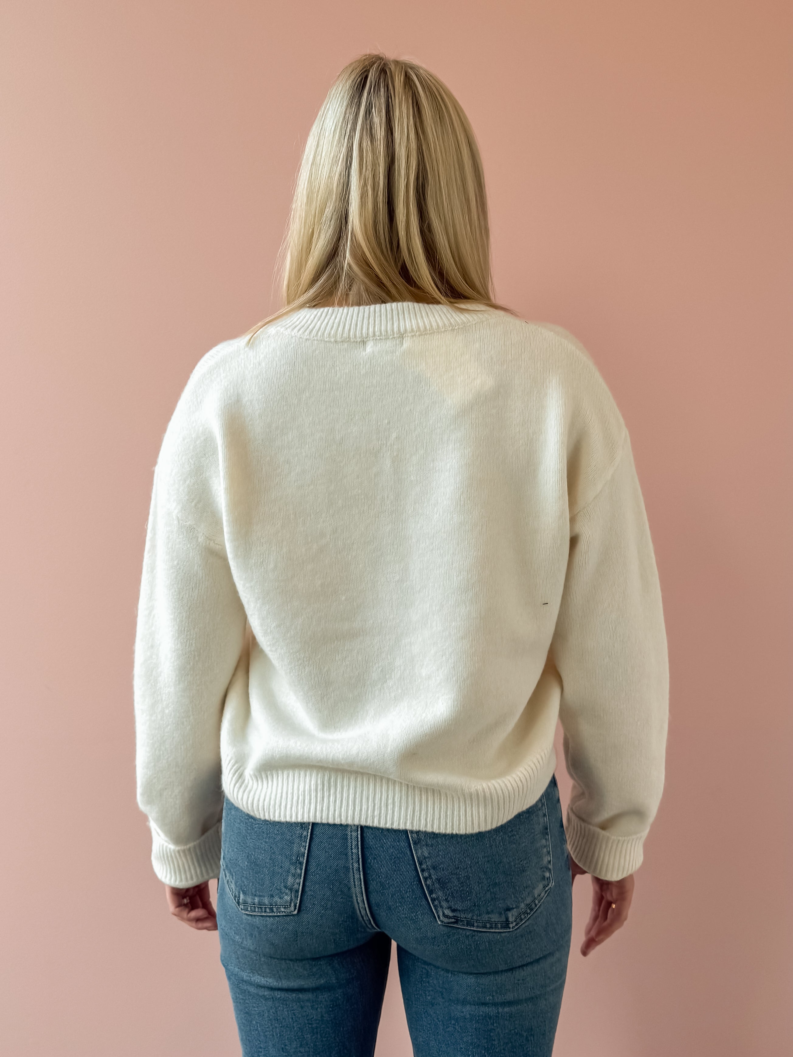 Adelyn Rae Angie Sweater in white, back close-up.