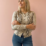 Current Air Snake Bite Cardigan in taupe snake print, front close-up.