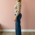Current Air Snake Bite Cardigan in taupe snake print, side view.