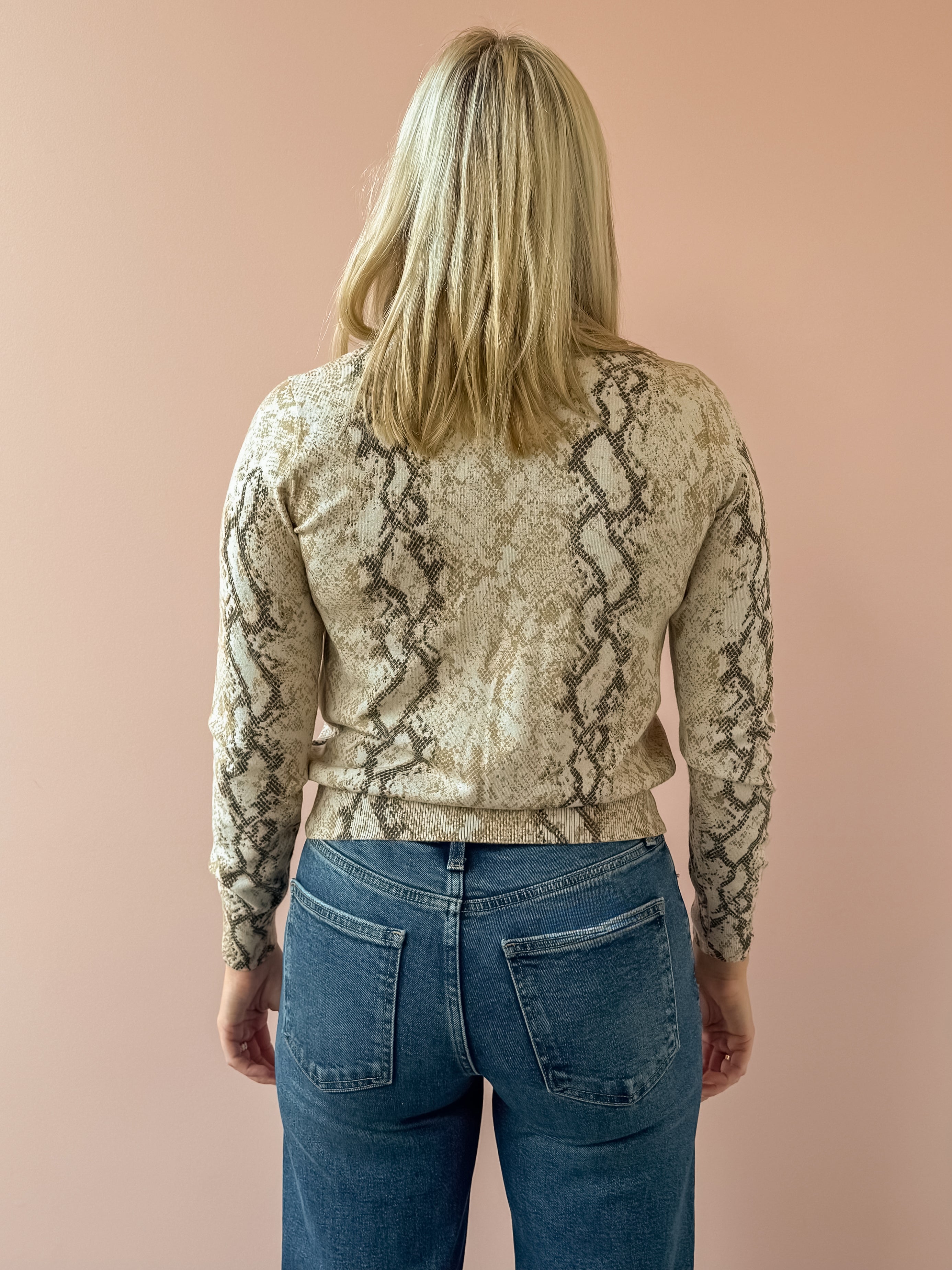 Current Air Snake Bite Cardigan in taupe snake print, back close-up.
